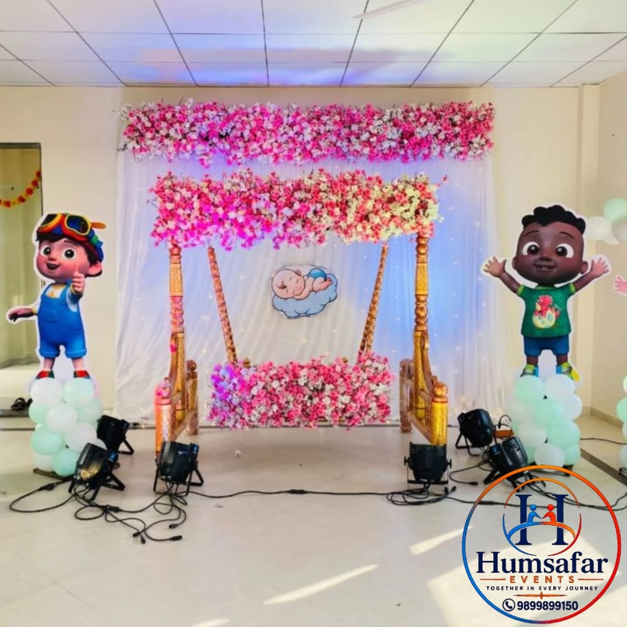Floral Cradle Ceremony Setup with Cartoon Cutout Theme