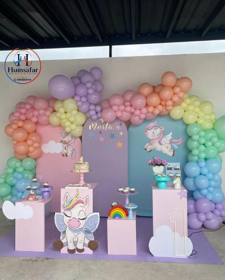 ​Multi-Panel Pastel Unicorn Candy Table Setup