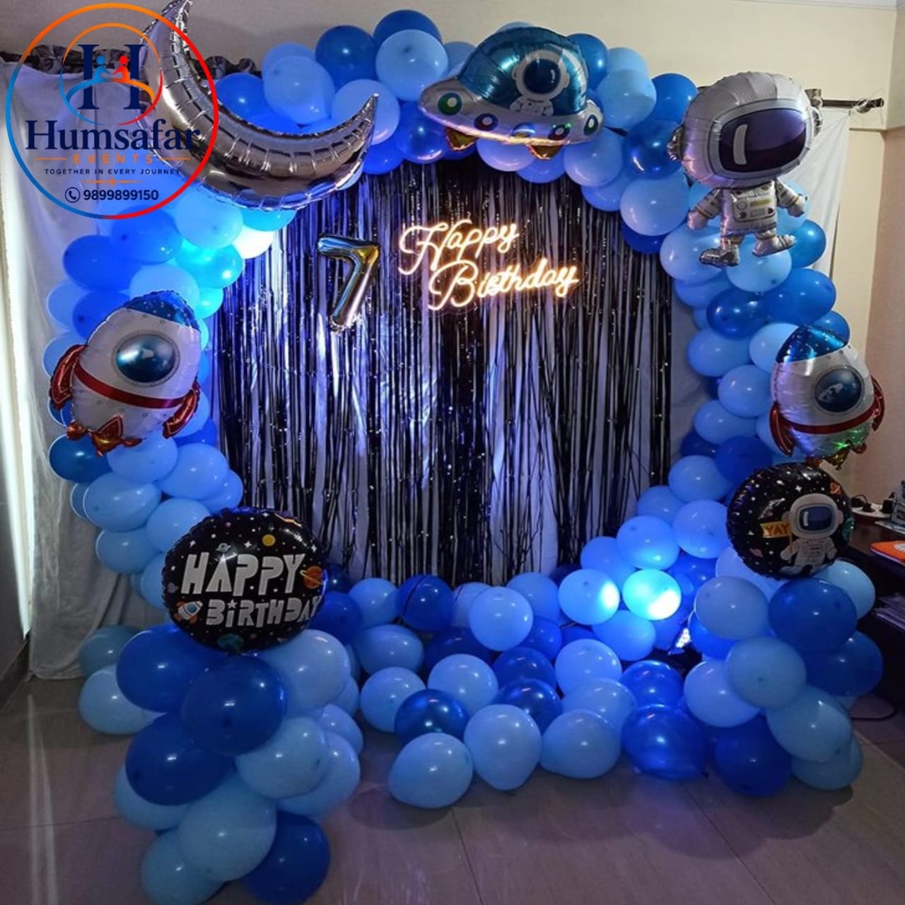 Curved Space Balloon Arch & Fringe Wall 7th Birthday